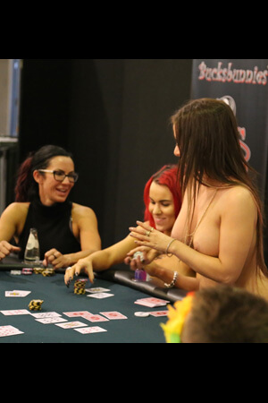 female topless poker dealer working at a bachelor party