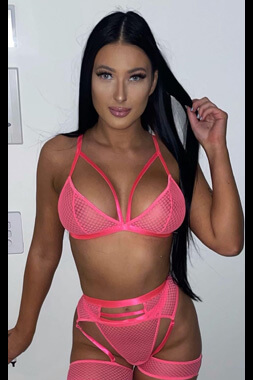 big boobed topless waitress posing in pink lingerie and playing with her hair in brisbane's cannon hill